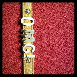 Brown leather snap bracelet says OMG!
